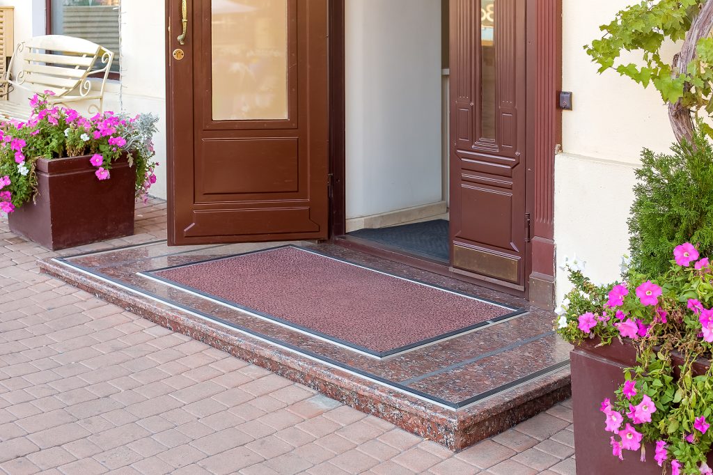 EMS entrance matting systems - threshold with mat on entrance door in hotel