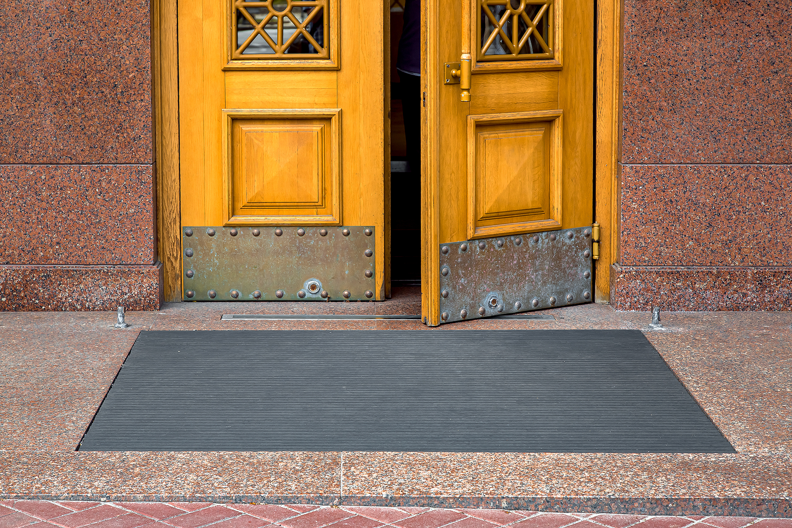 specialist mats - black rubber foot mat at opening yellow door
