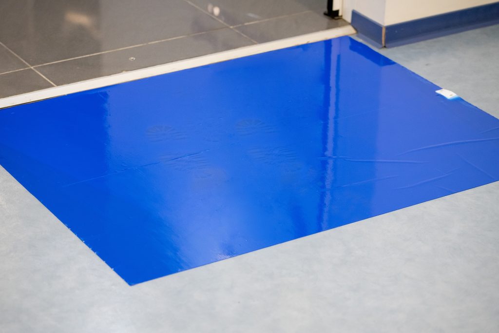 Specialist mats - Blue Adhesive Sticky Mats for disinfection at hospital entrance